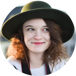 woman in hat smiling